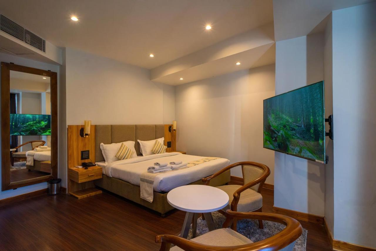 Emerald Hotel Āīzawl Extérieur photo
